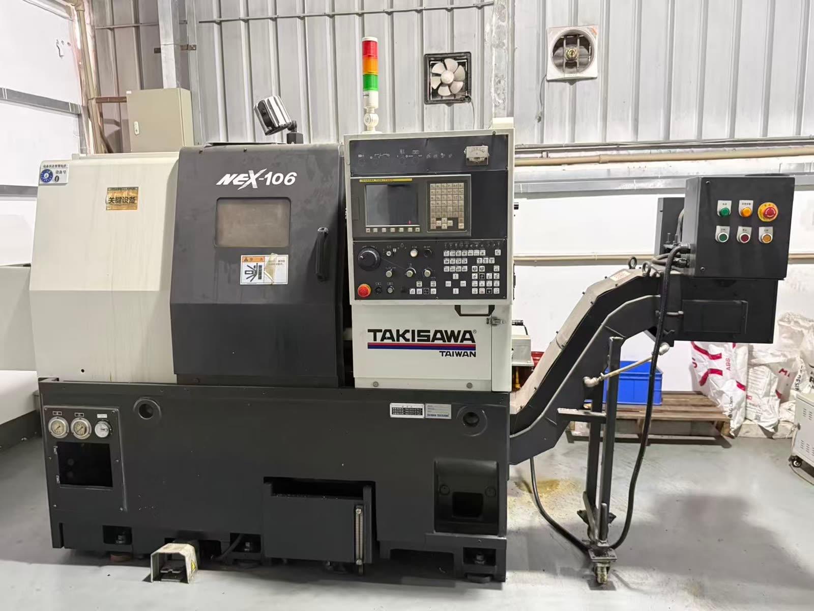Takisawa CNC lathe in operation at Ginwate precision machining facility